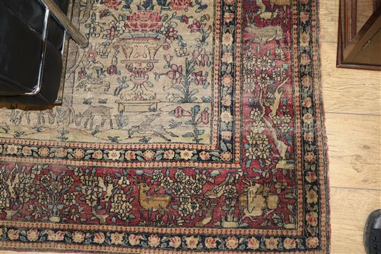 A Caucasian rug with triple medallion on a blue ground and two worn Persian rugs 210 x 120cm, 205 x 135cm and 195 x 145cm